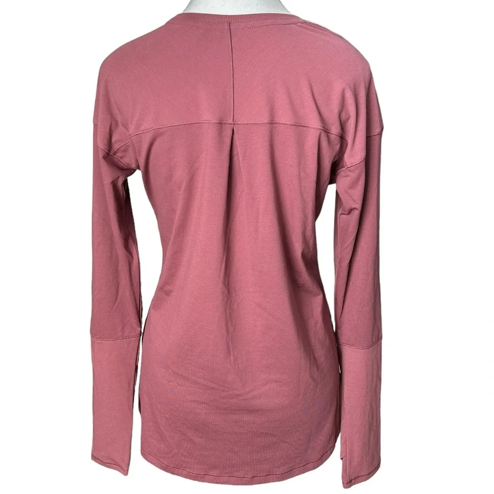 The North Face Women’s Dawndream Loose Fit Long Sleeved Top in Wild Ginger